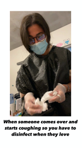 Meme of a women with glasses in a medical smock and mash, with latex gloves holding a cleaning wipe and the words &quot;When someone comes over and starts coughing so you have to disinfect when they leave&quot;.