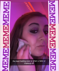 Meme of a woman wearing evening makeup and wiping her cheek with a makeup remover wipe and the words &quot;the best feeling ever is when u take ur makeup off&quot;. The image is framed with the words &quot;MEME&#039;.