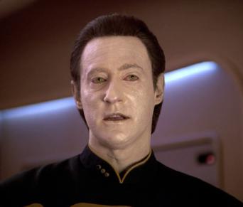 This image shows the character called "Data" from famous TV show "Star Trek: The Next Generation" who had difficulty understanding metaphors.