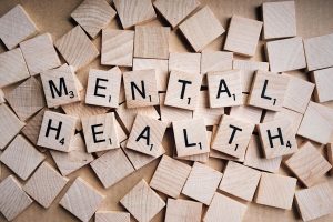 Title "Mental Health" spelled with letter tiles