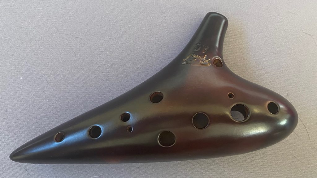triangular ceramic wind instrument