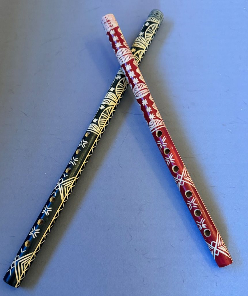 Short flute from Romania with colored decorations